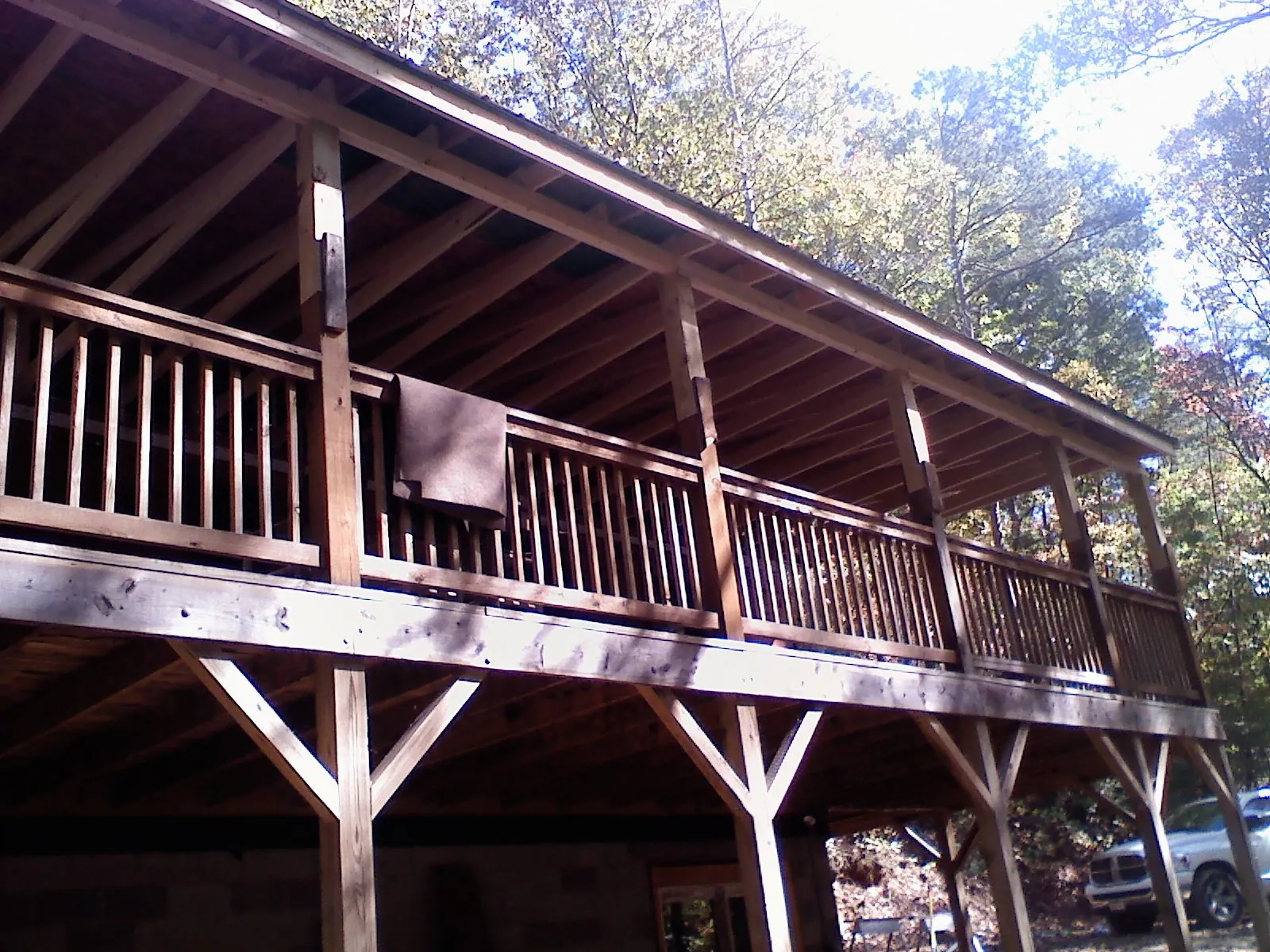 Timber framing under a new elevated porch and deck — Roof Leak Repair in Pasadena by Roofing Brothers